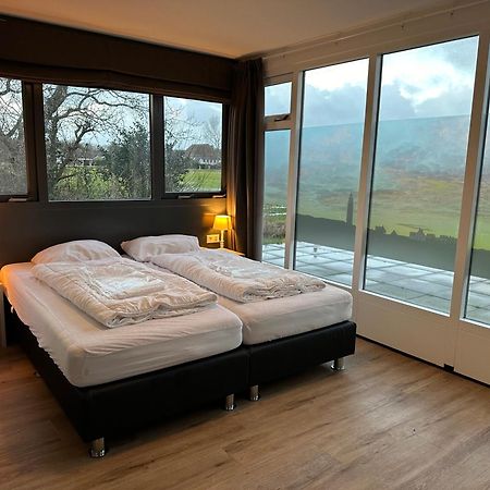 'T Eibernest Villa De Cocksdorp  Bagian luar foto